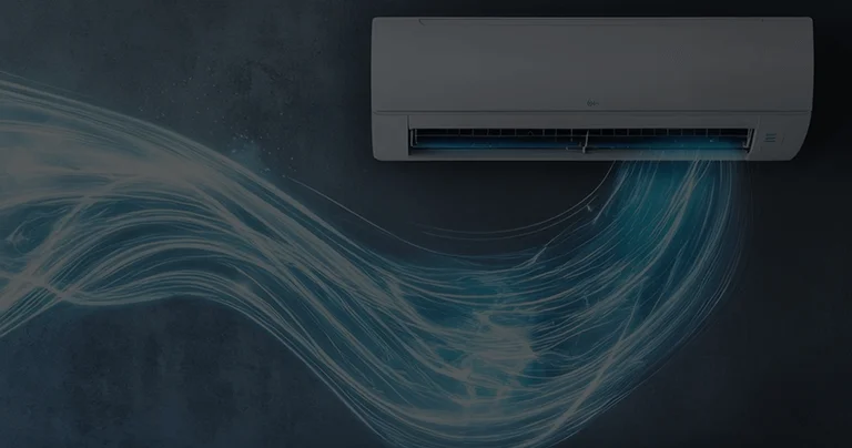 A white air conditioner emitting blue smoke, indicating a possible malfunction or unusual operation.