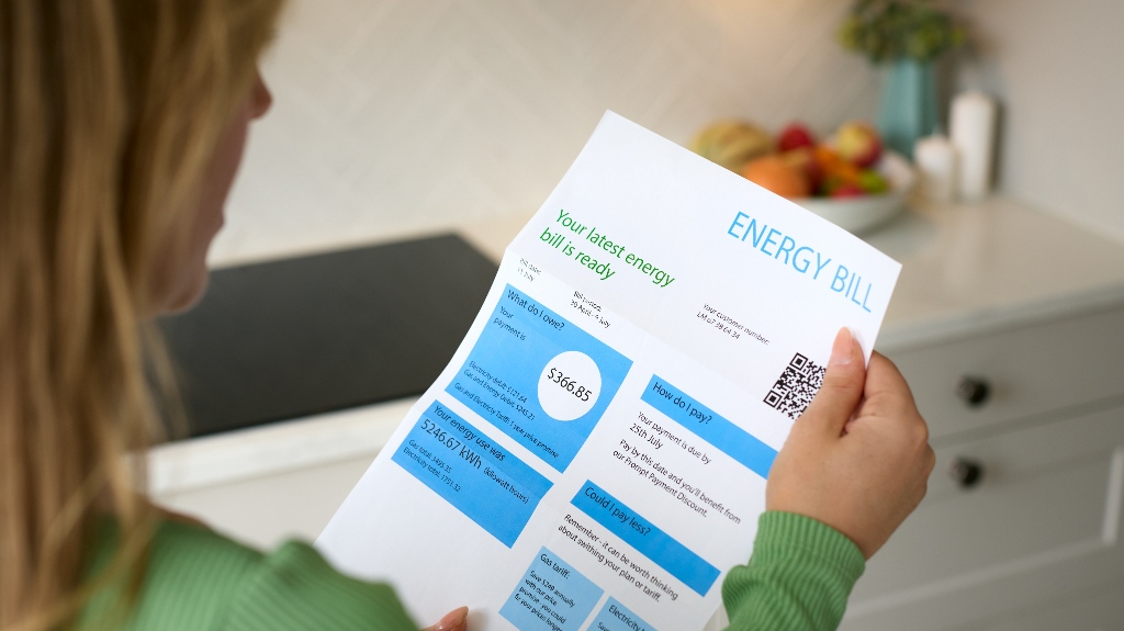 woman is opening energy bill