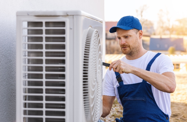technician working on air conditioning
