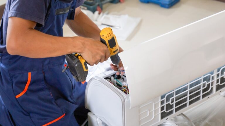 man installing an air conditioning
